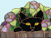 black cat in flower pot